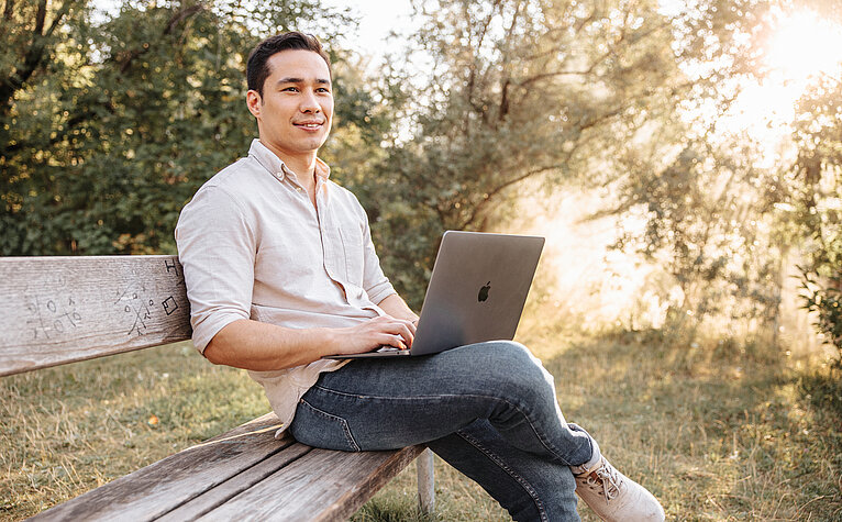 Nature view with work on laptop