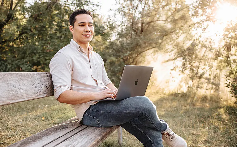 Nature view with work on laptop